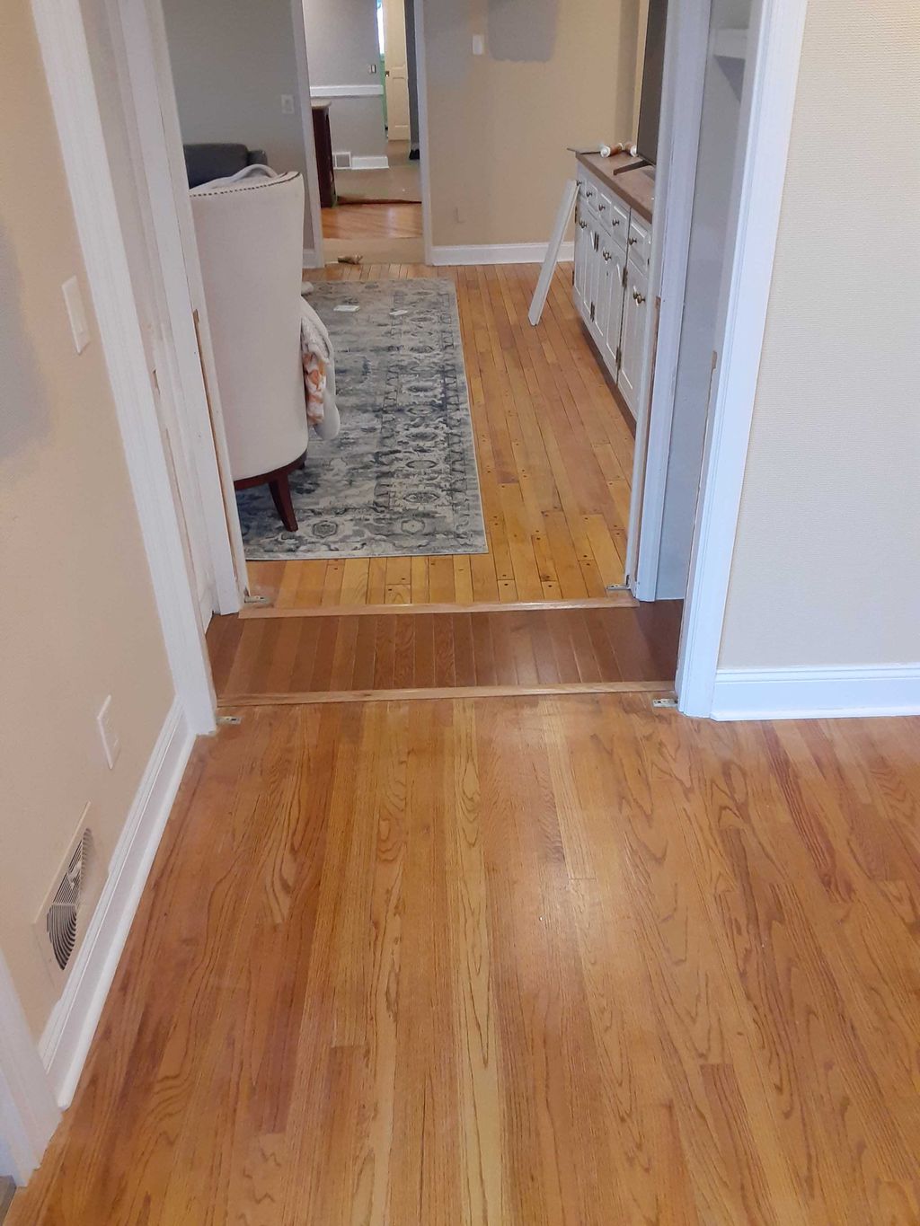 We removed a butler closet to open up a walkway be