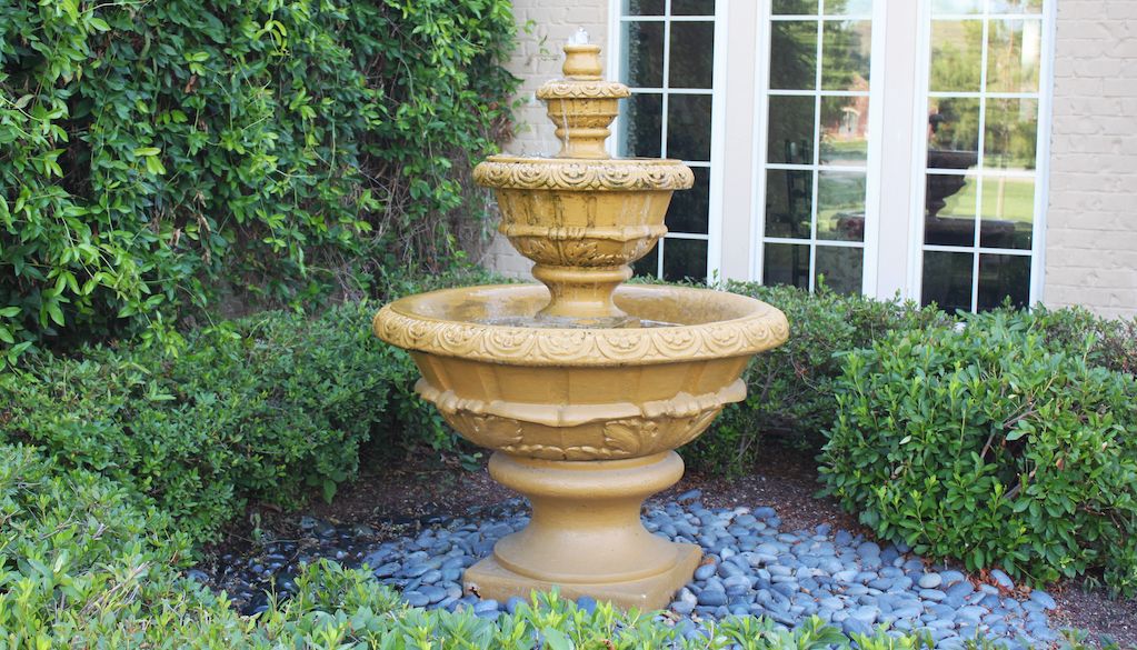 outdoor water fountain in yard