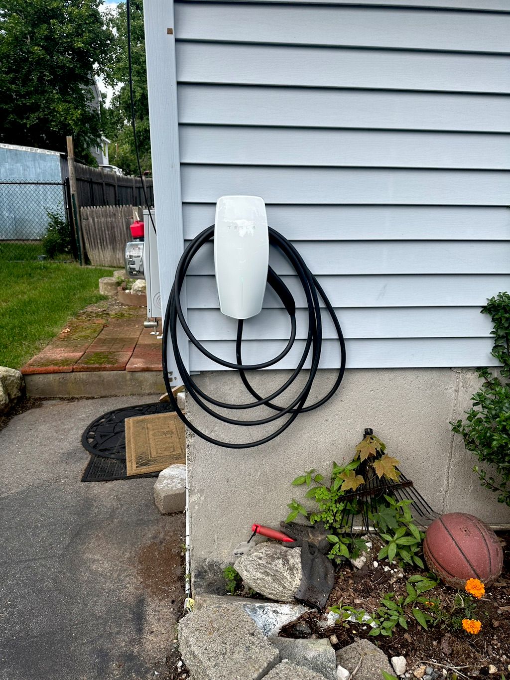 Wall Tesla Charger outside 