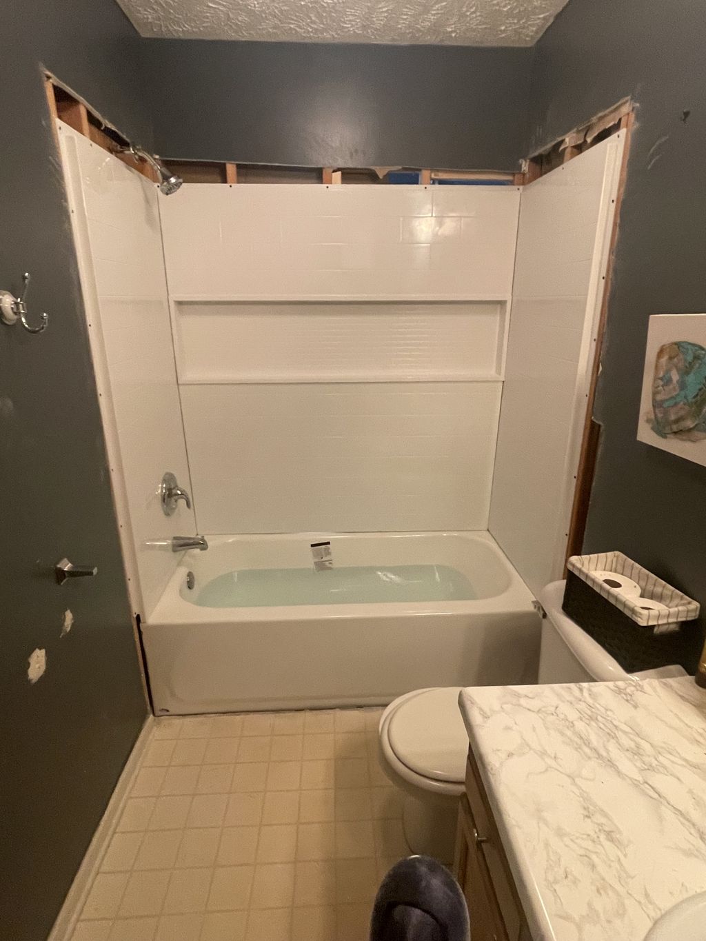 Four piece tub installation