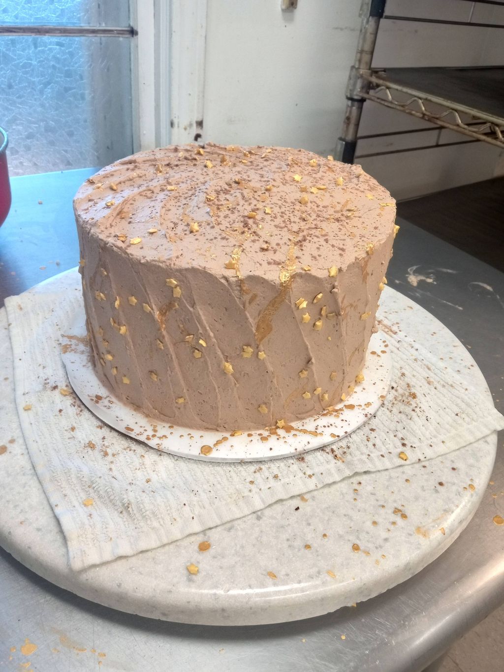 8" Chocolate cake w/ chocolate butter cream icing