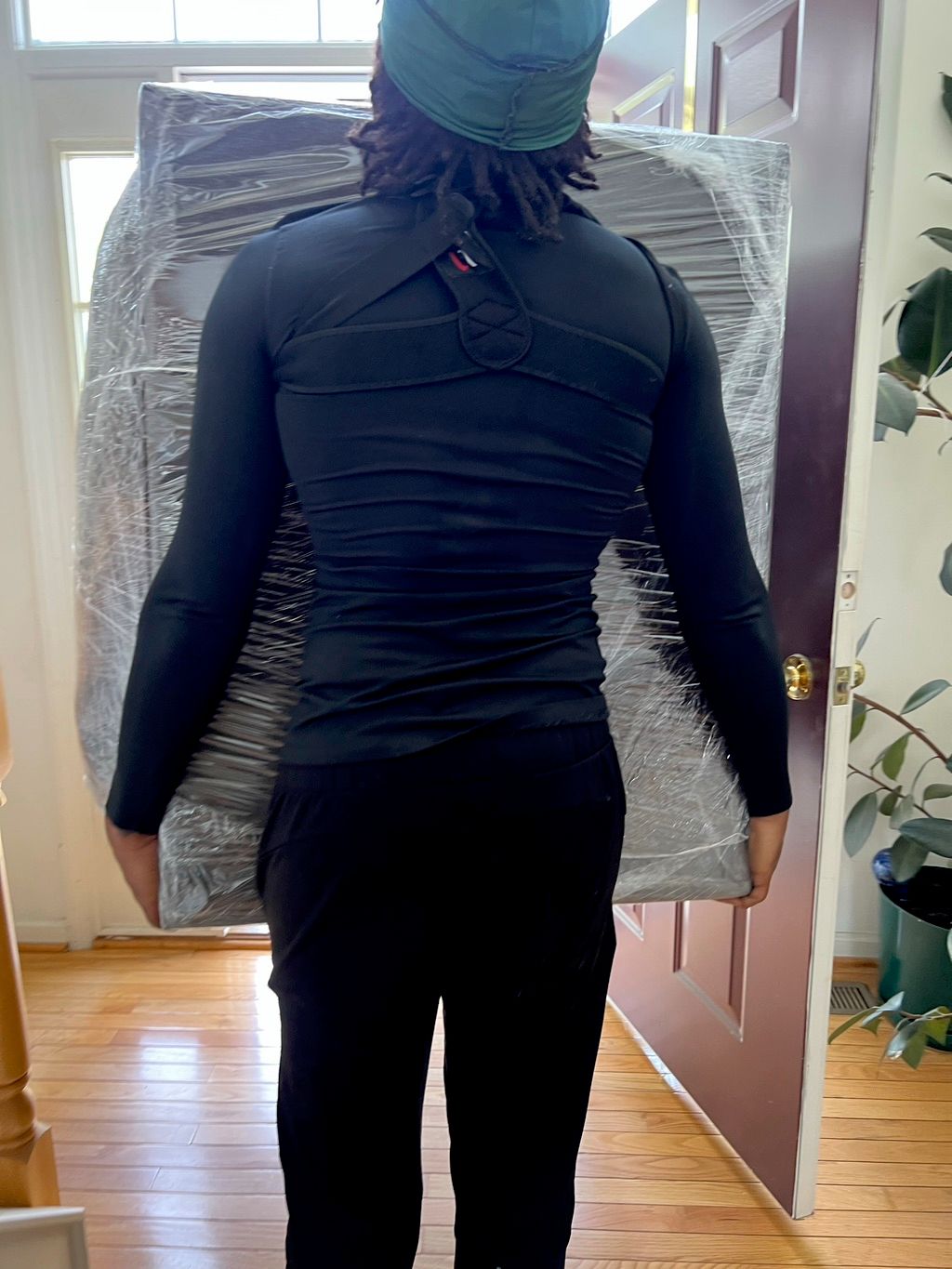 Moving a heavy sofa through the doorway 