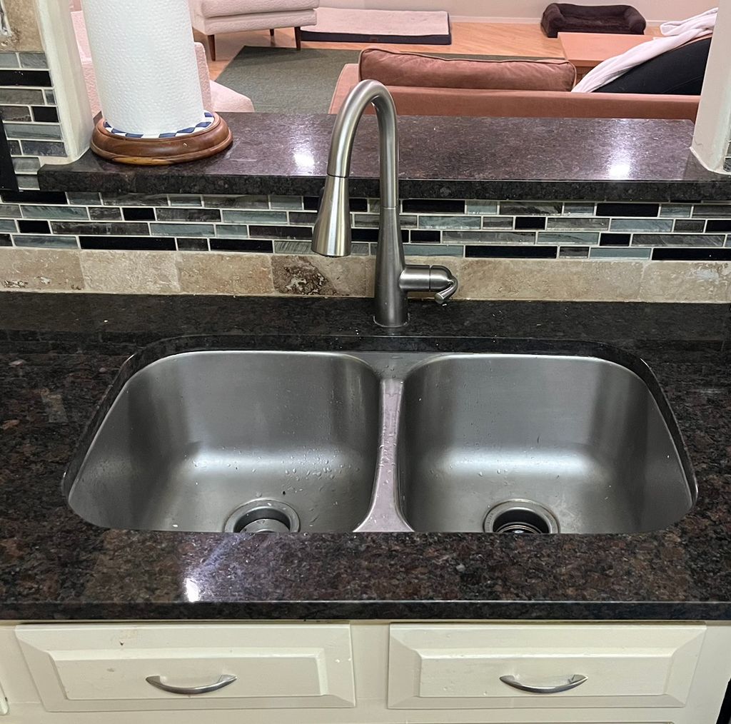 Before, photo of faucet.