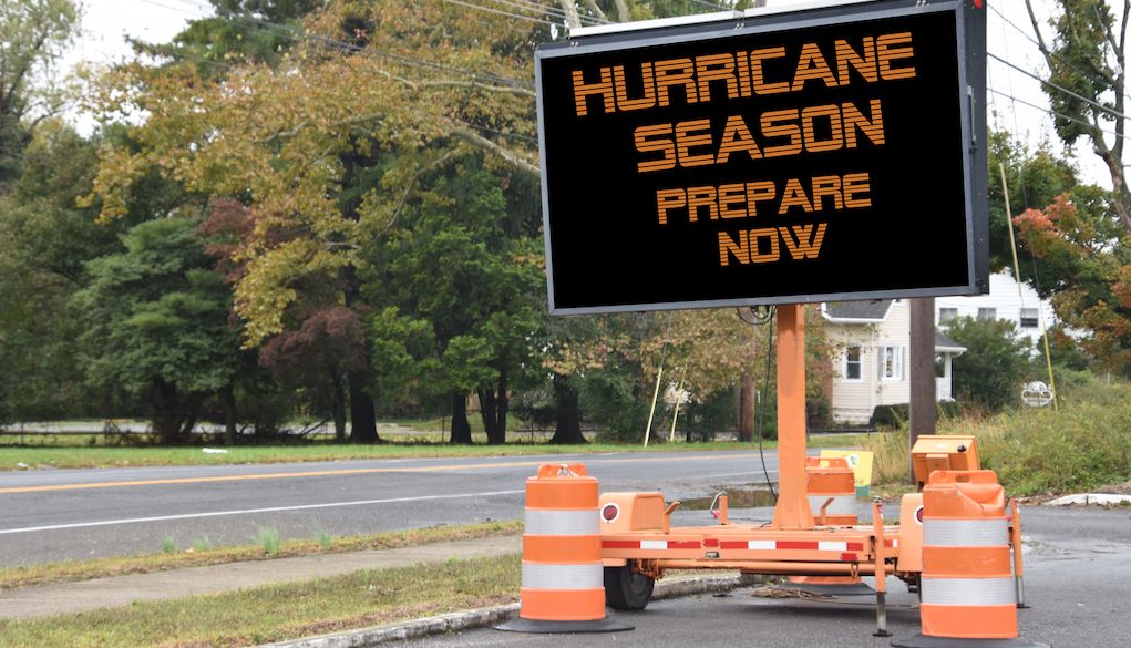 "prepare for hurricane" sign on road