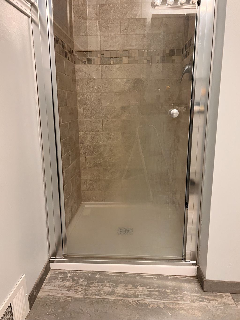 Before water build up on shower glass