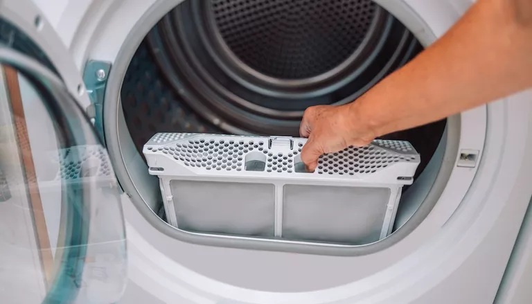 How to Clean a Dryer Lint Trap Quickly | Thumbtack