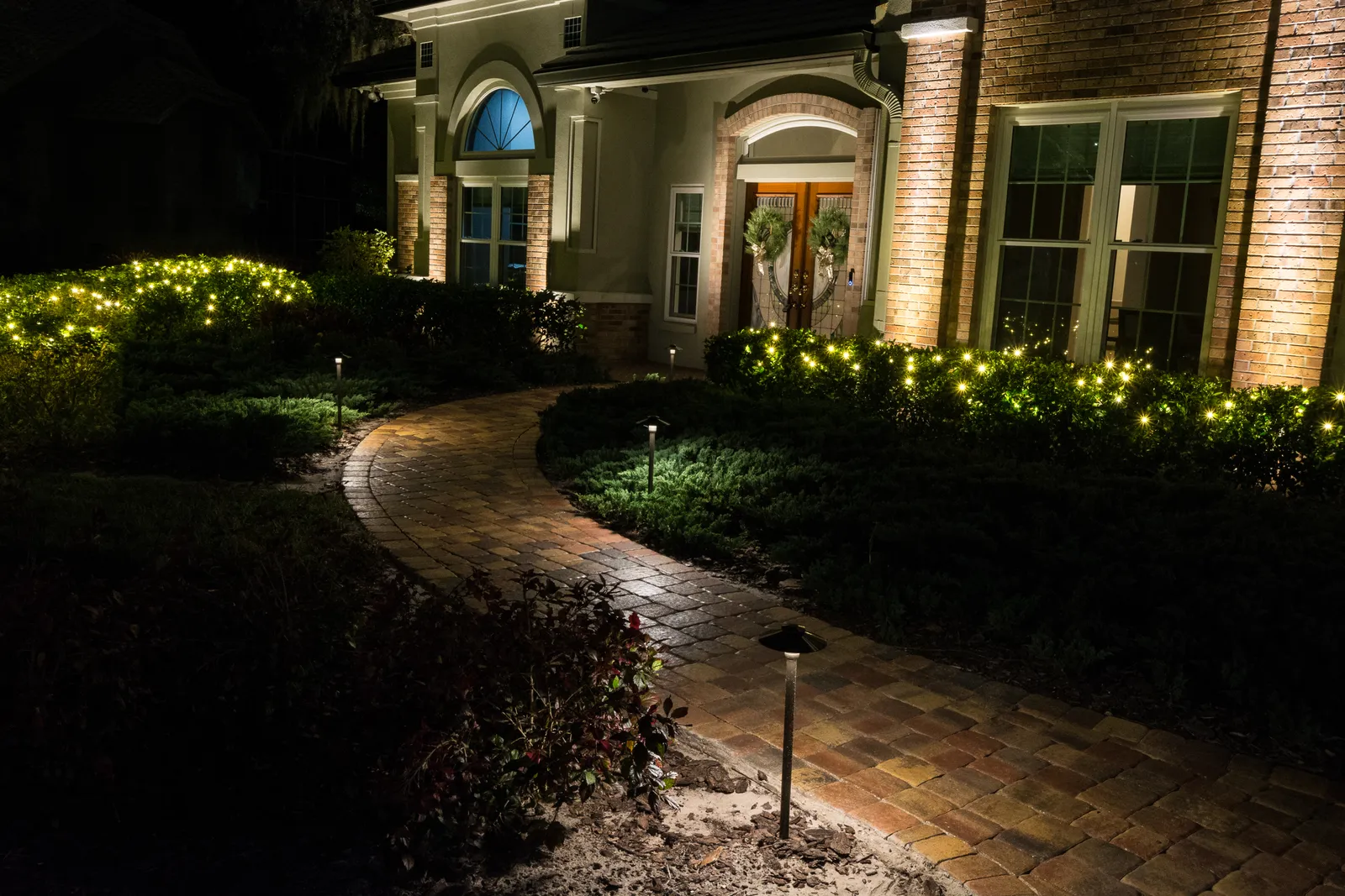 low maintenance front yard curb appeal idea: landscape lighting