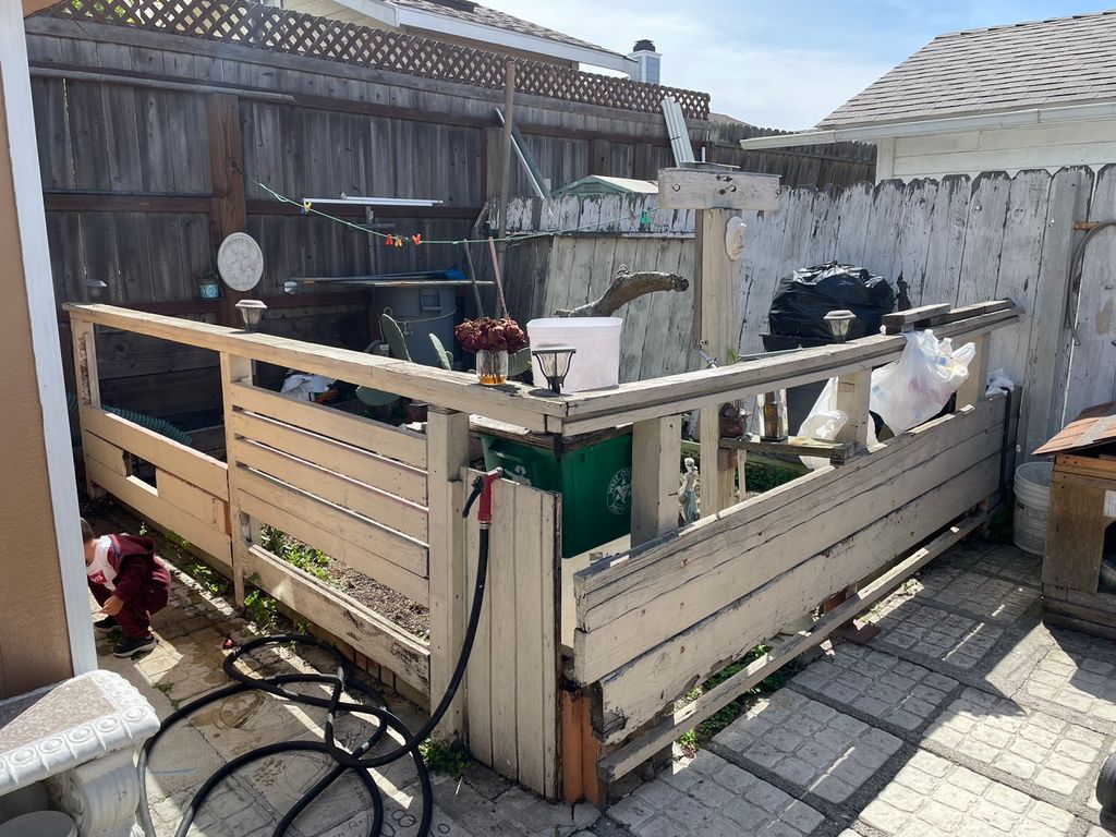 Wood Fence removal. Before 
