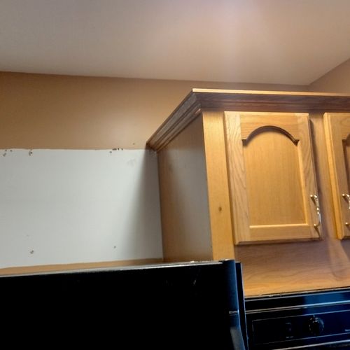 We hired Keir to take down a two-door cabinet that