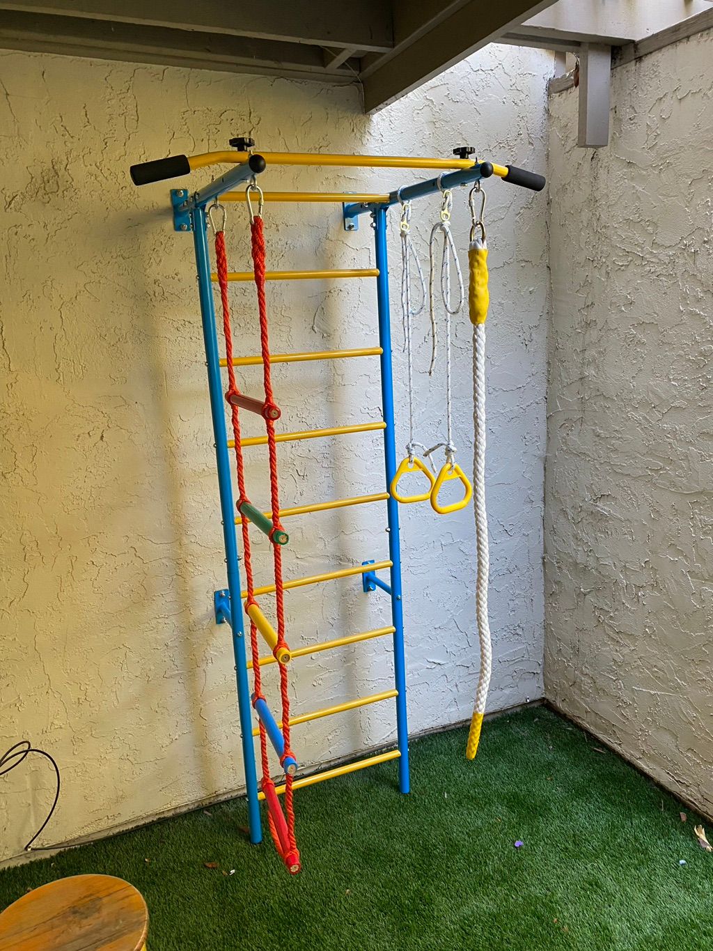 Assemble play structure & anchor to wall