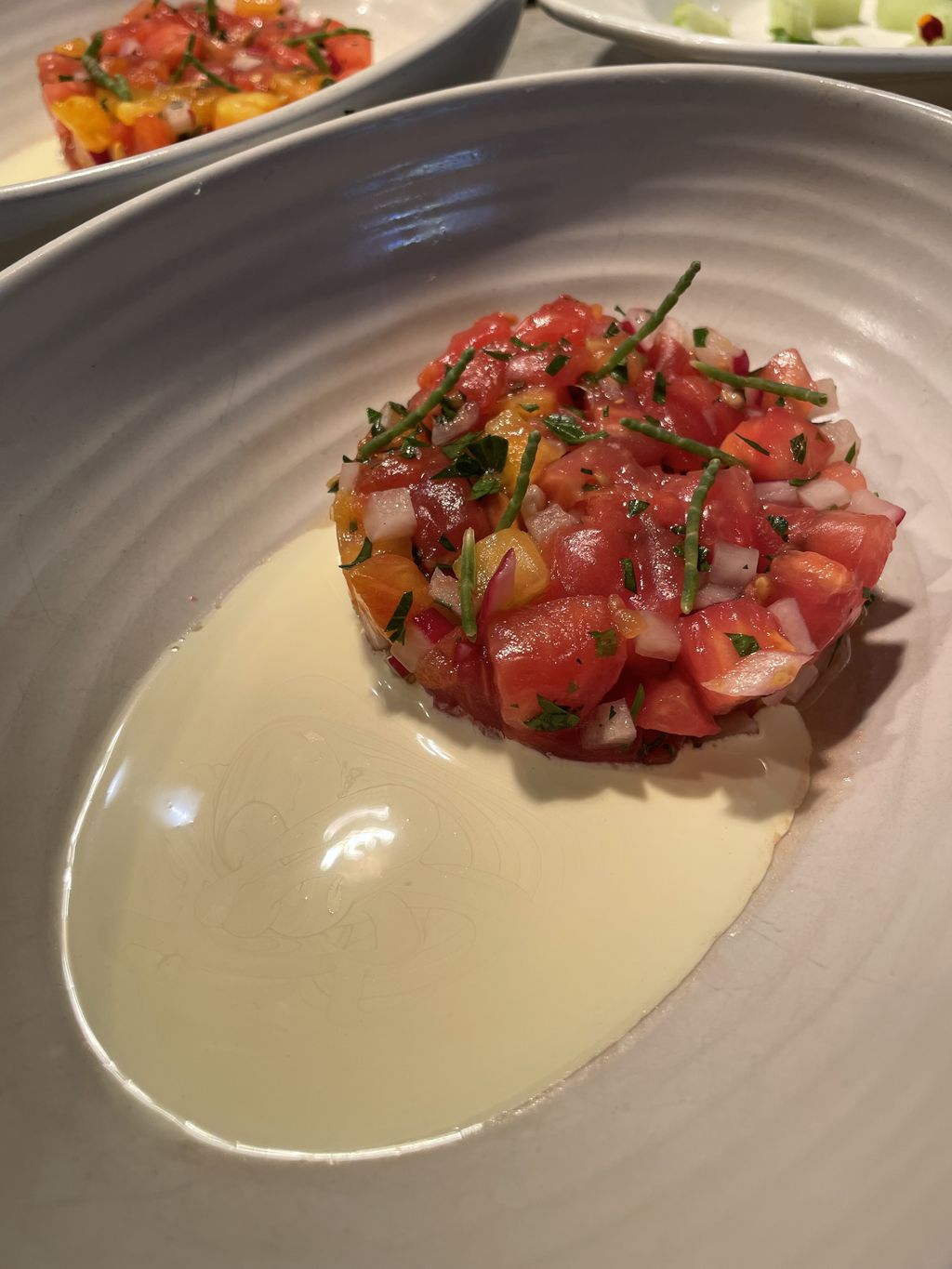 Tomato tartar, saffron emulsion, seabeans
