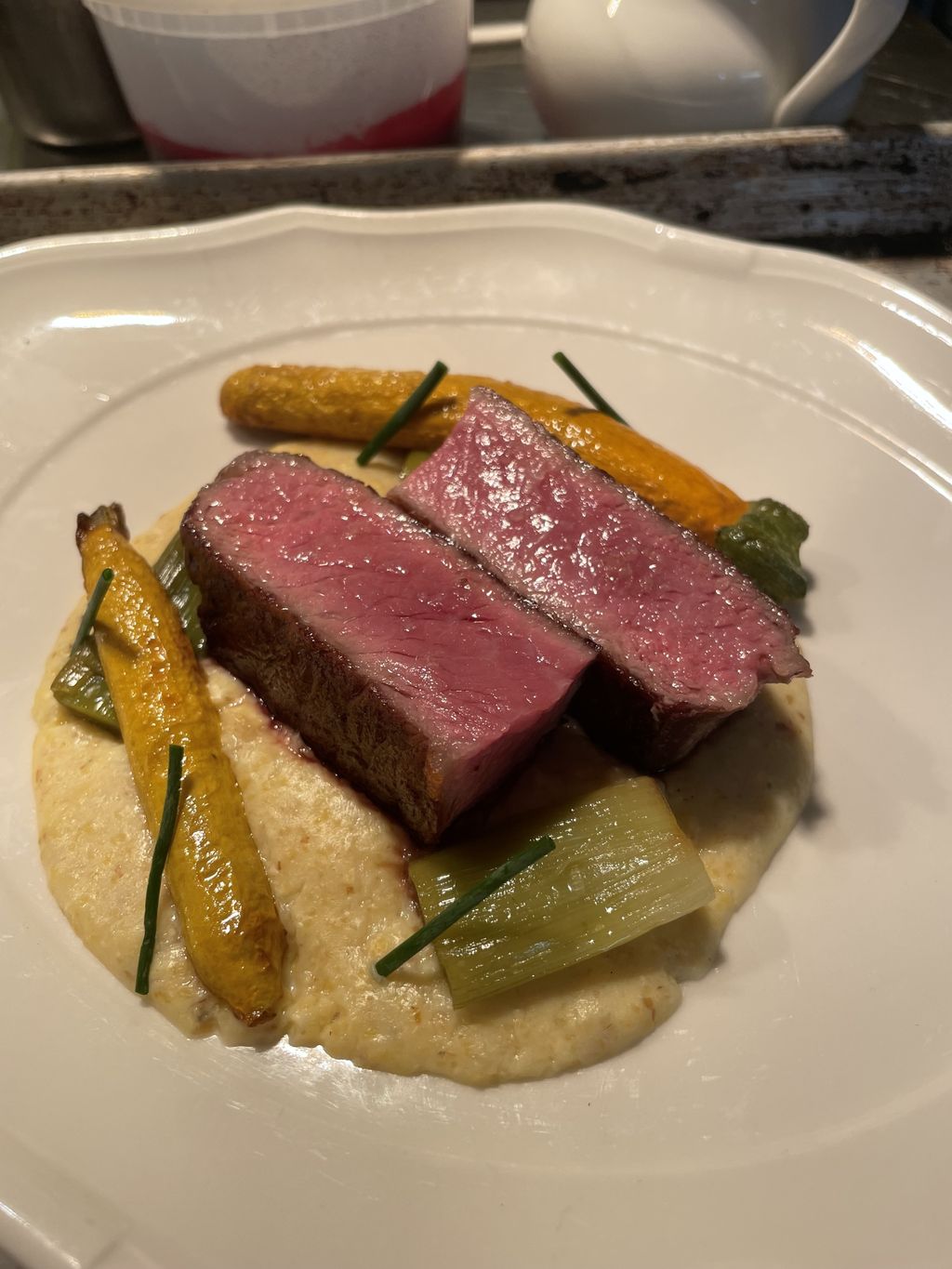 NY strip, heirloom polenta, summer squash, roasted