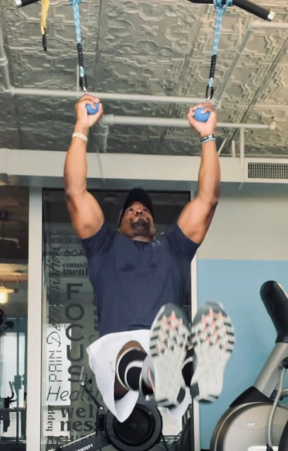 Pull-ups…. By attempting pull-ups using the hangin
