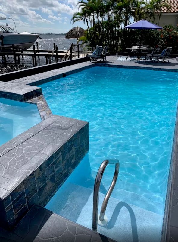 Crystal-clear blue pool on the  water