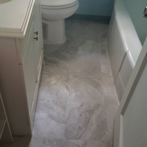 Jo'Quan installed bathroom floor tiles. He was qui