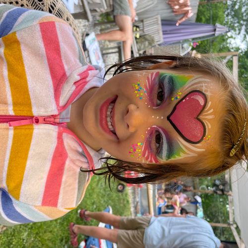 My daughter had her face painted by Pixie & Luna a