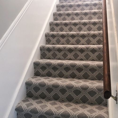 Patterned carpet with memory foam pad