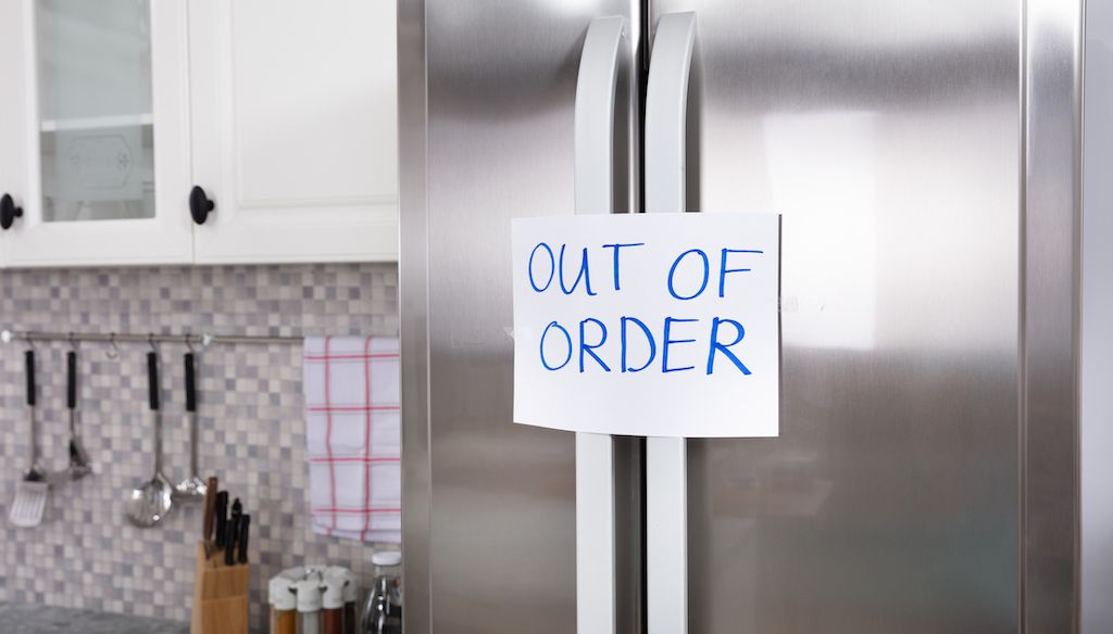 home fridge with out of order sign