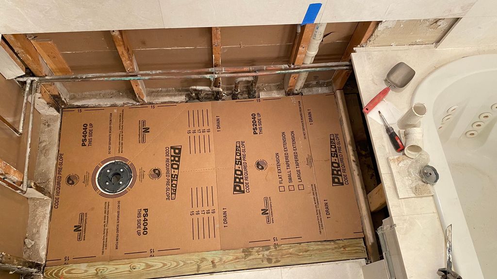 Shower pan slope 
