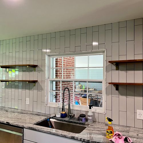 Coedy put some shelves up on our subway tile in ou