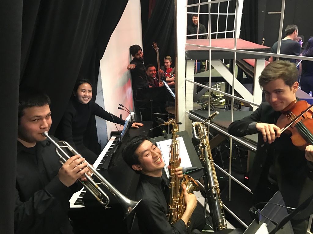 Music directing a musical while playing keyboards