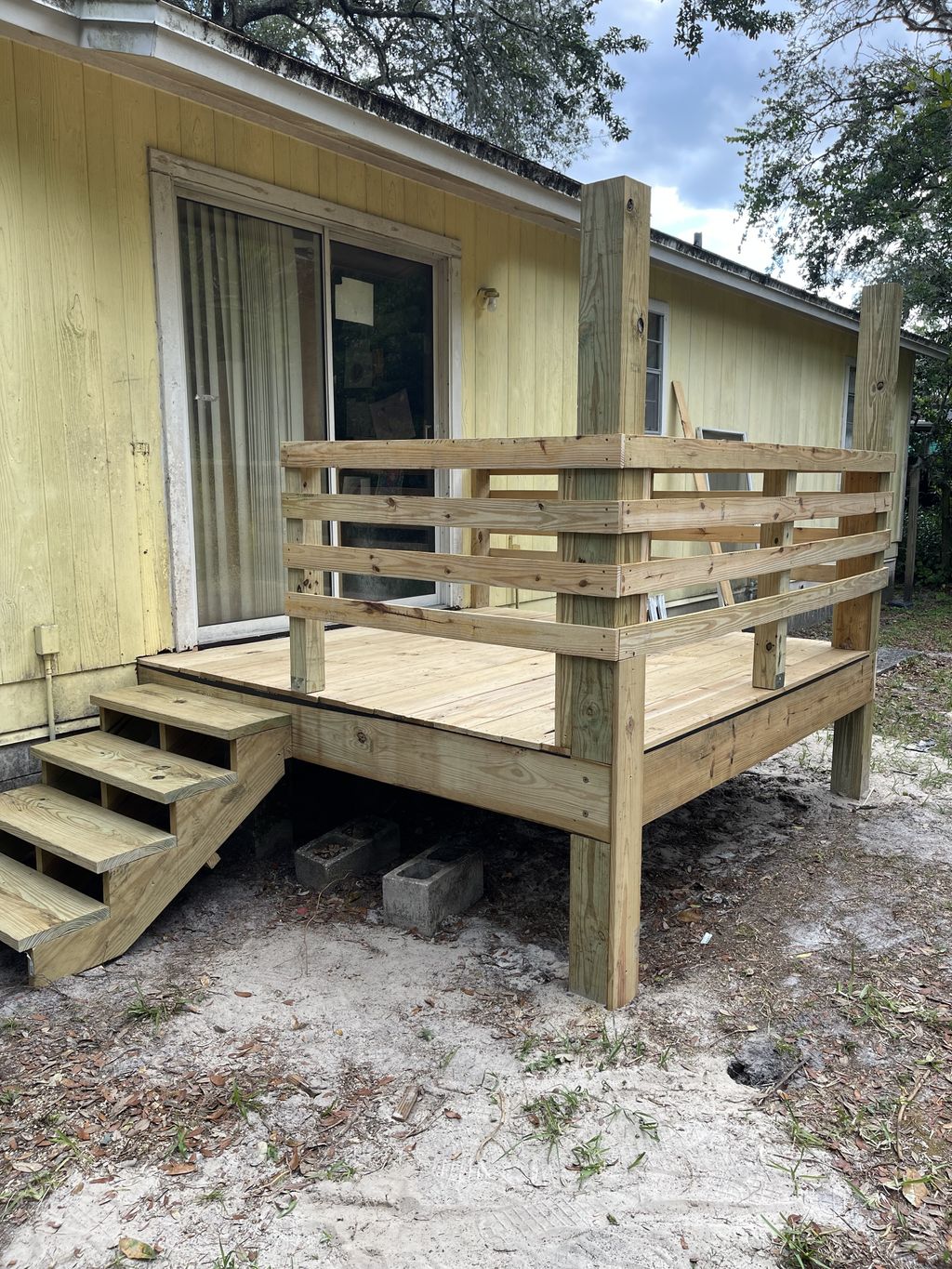 After back steps with expanded deck.