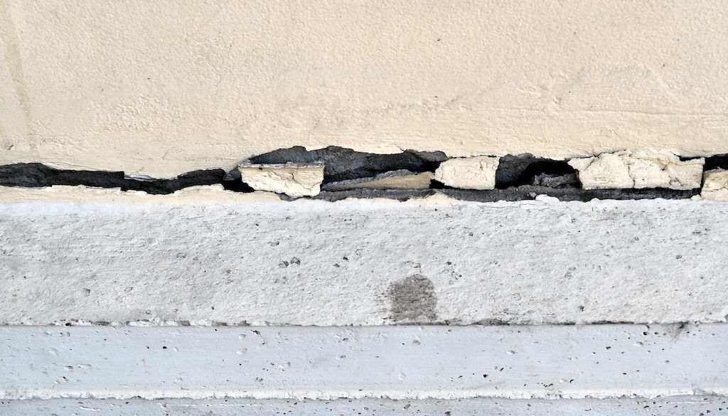 large horizontal crack in foundation of home or building