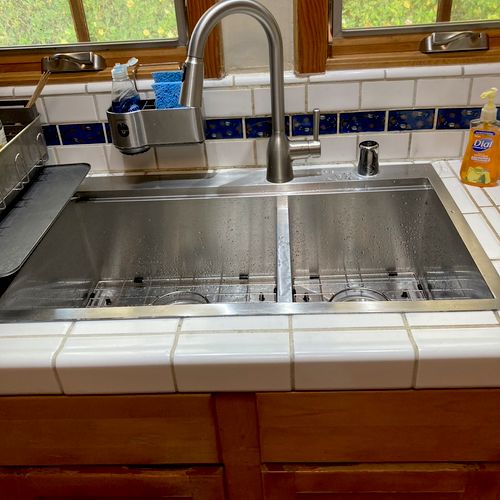 Replaced old cast iron sink with stainless steel 
