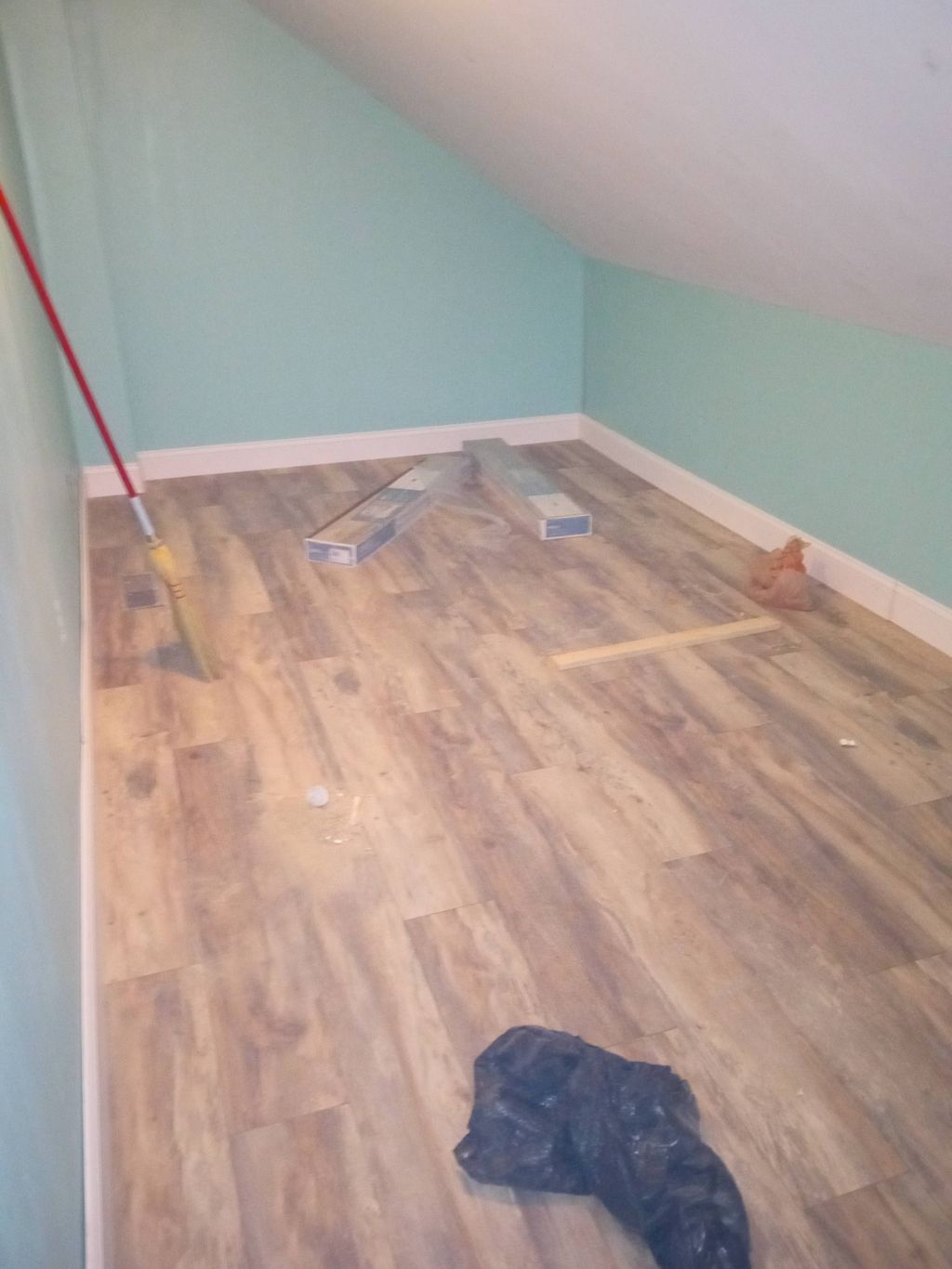 Hardwood laminate and baseboard