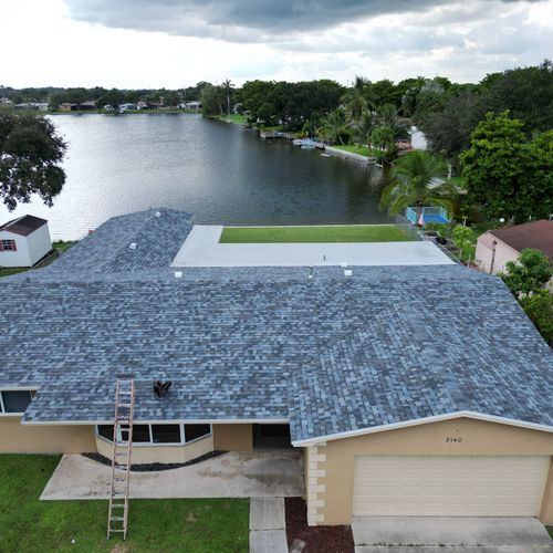 AFTER - Shingle and flat roof replacement 