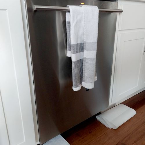 dishwasher leaking from left corner