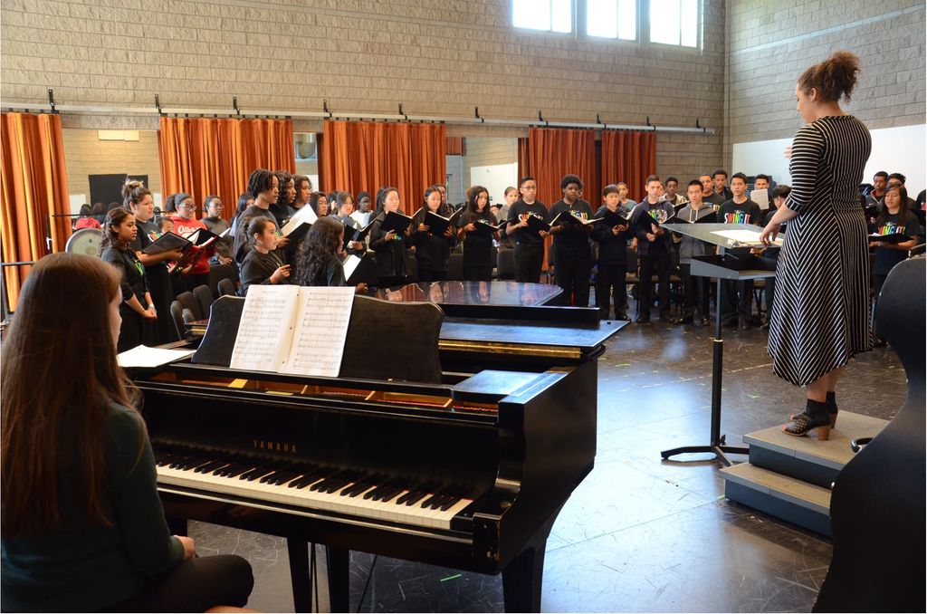 Melissa Angulo Leading Choral Rehearsal at Young M
