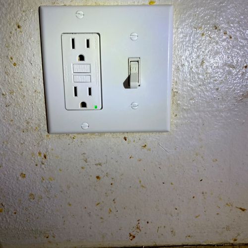 Gfci plug and switch installed in kitchen