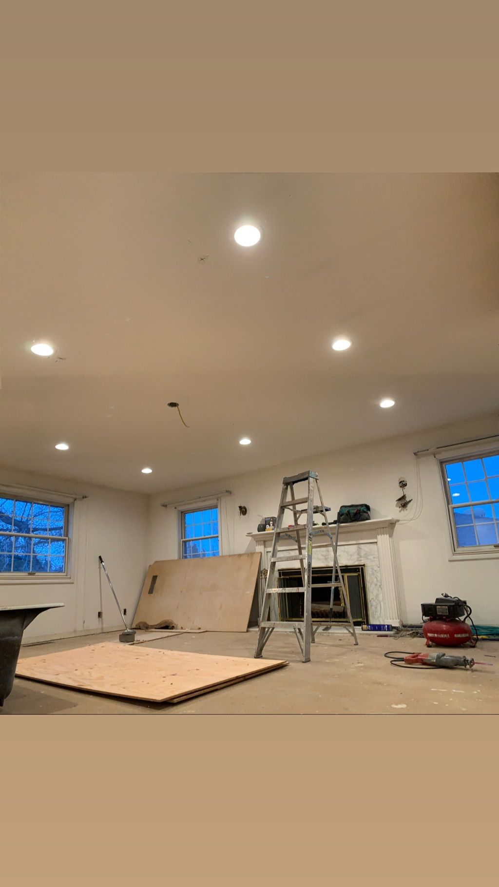 Remodeled living room lighting with fan in the mid