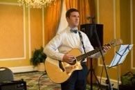 Tim played guitar and sang during our wedding cere