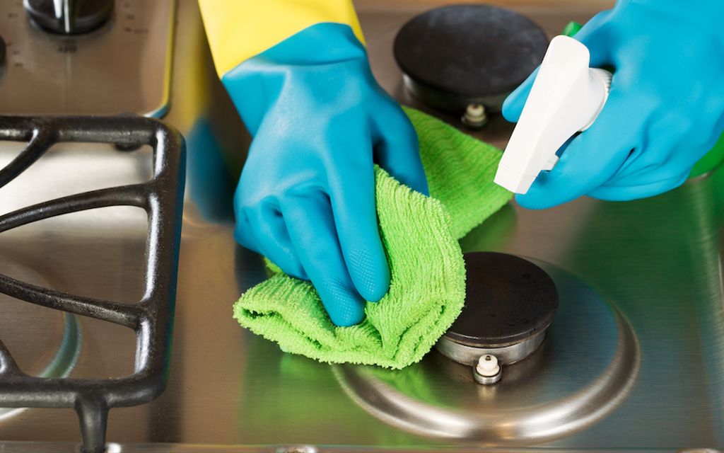 How to clean a gas stove top.