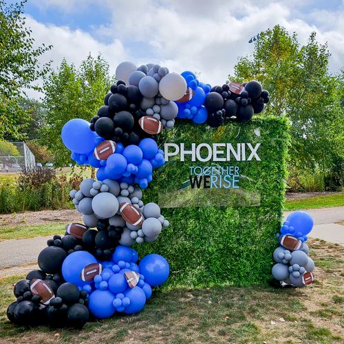 Memorable Balloons did a great job with our backdr