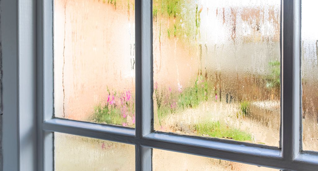 moisture and condensation on old window 