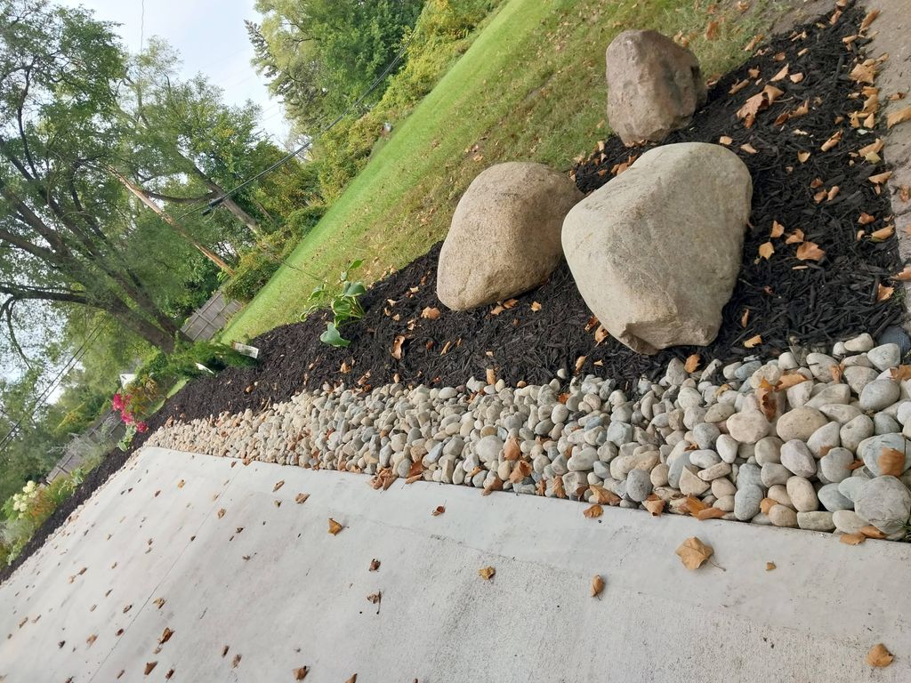 Boulder placements, flower planting