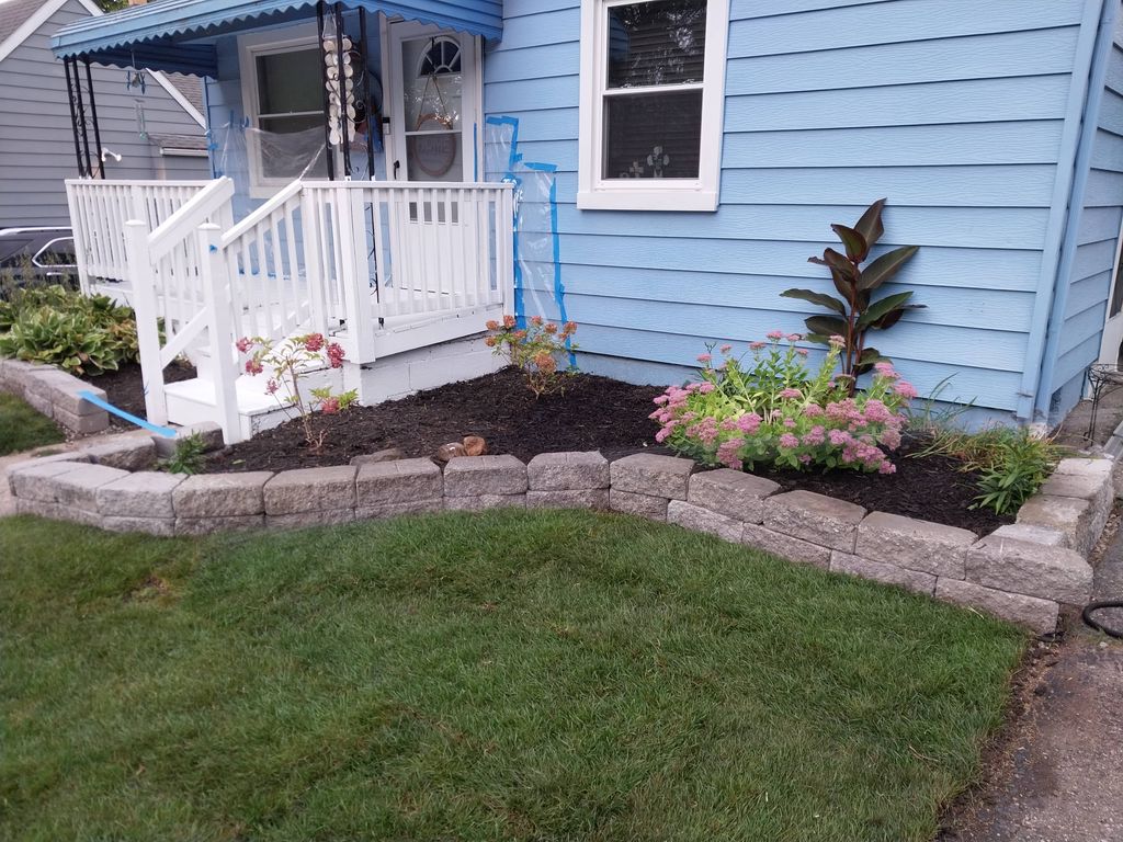 Sod installation, mulch bed restoration, deck pain