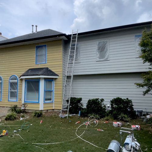 Painting after new siding installation 