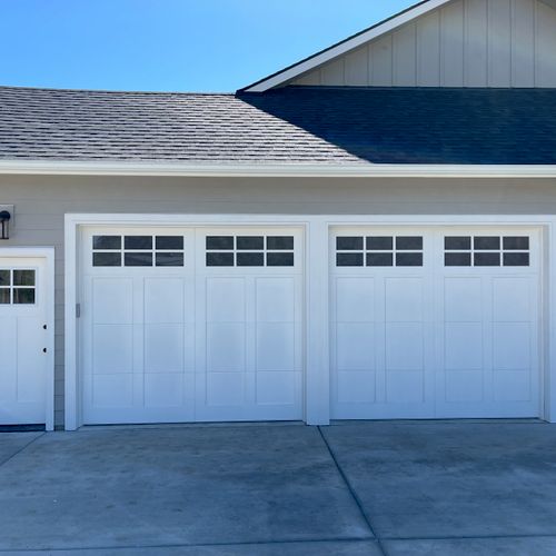 These 2 new carriage house garage doors matched pe