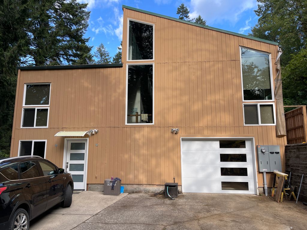 This contemporary flush garage door was an excelle