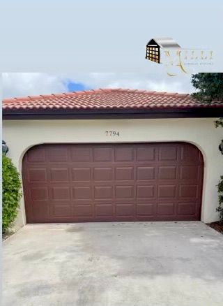 Garage door repaired and back to normal operation.
