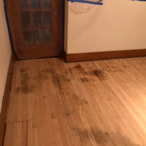 Got carpet removed & original wood floors refurbis