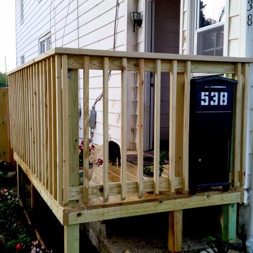 Front entry deck over old concrete stairs. 