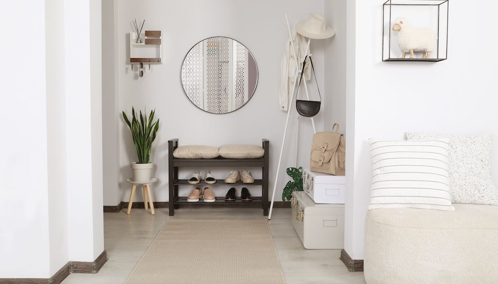 cozy entryway in cream and light colors