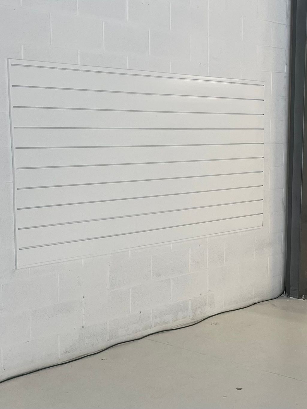 Wall rack installation for auto shop
