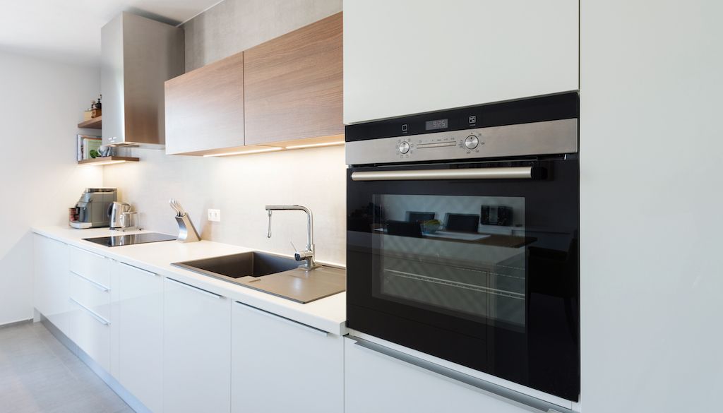 wall oven on modern white kitchen wall