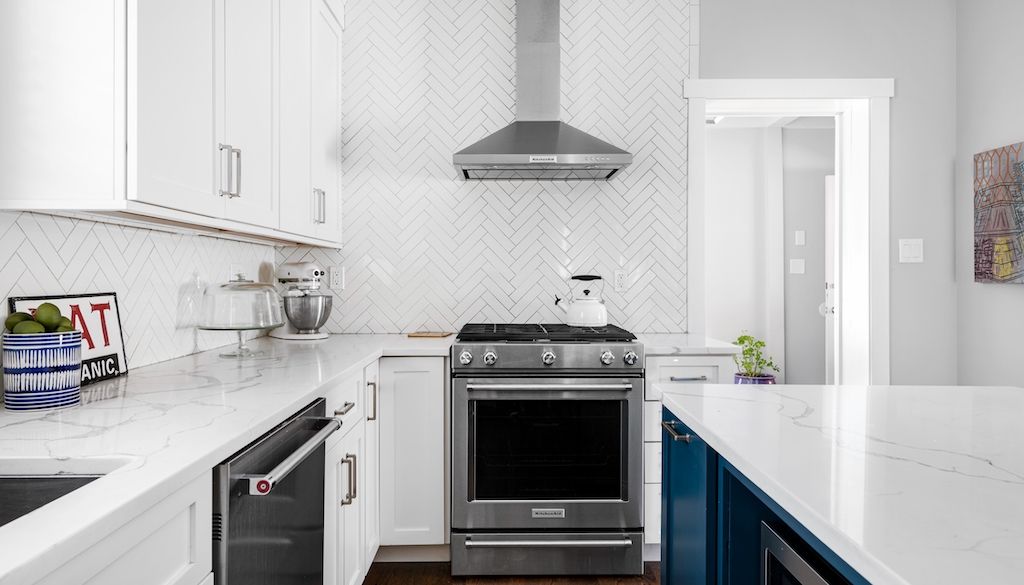 kitchen layout with an oven range stovetop